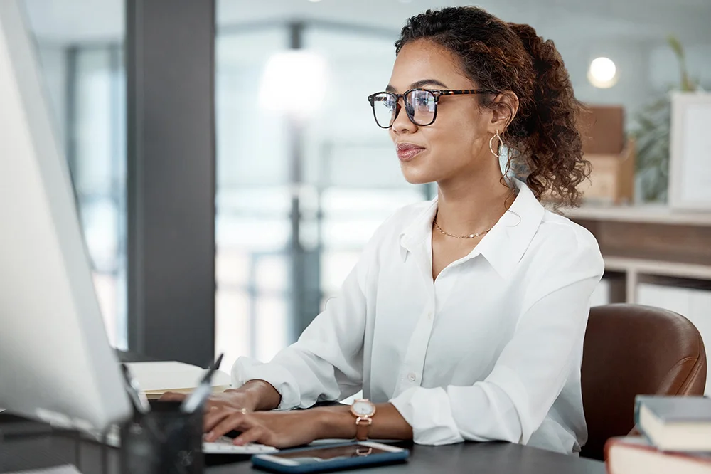diamonddog office-woman-using-the-computer How AI Is Reshaping Healthcare Marketing  
